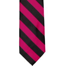 Load image into Gallery viewer, The front of a fuchsia and black striped tie, laid out flat