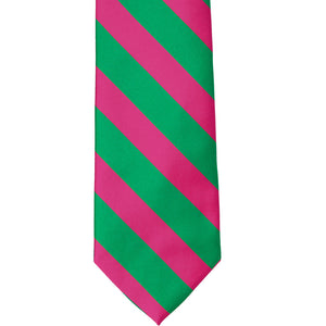 The front of a kelly green and fuchsia striped tie, laid out flat
