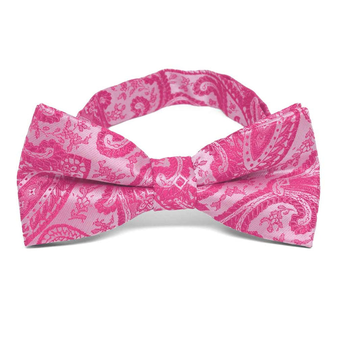 Bright fuchsia paisley bow tie, close up front view