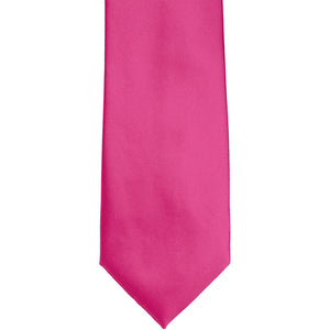 The front of a fuchsia solid tie, laid out flat