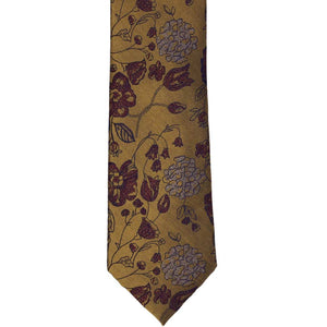 Bottom front view of an old gold floral necktie