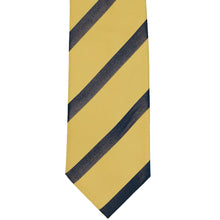 Load image into Gallery viewer, The front of a light gold tie with navy blue ribbed stripes
