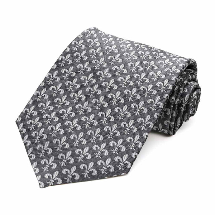 Gray on gray fleur-de-lis tie, rolled to show the woven texture