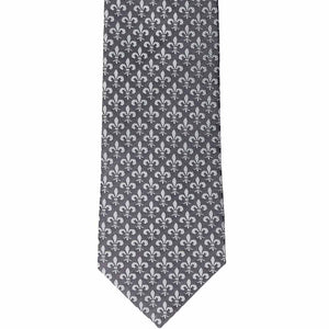 The front of a gray tie with a fleur de lis pattern