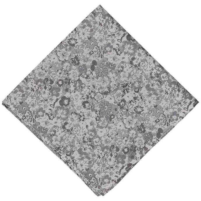 A gray pocket square with an all over small floral design