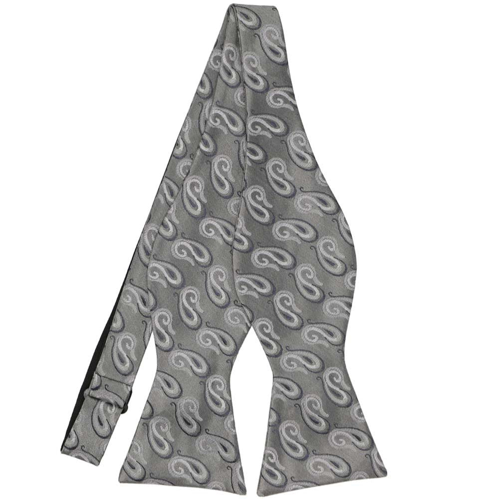 A gray paisley bow tie in a self-tie style. Displayed untied