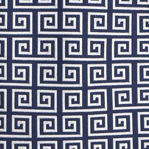 Closeup of a navy blue and white greek key necktie