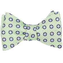 Load image into Gallery viewer, A tied green and blue medallion self-tie bow tie