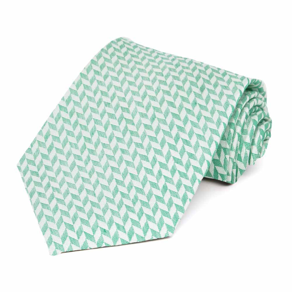 Rolled view of a mint green and white herringbone necktie