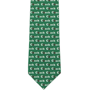 The front view of a green tie with the word Coach repeated and a football for the letter O