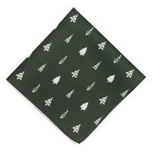 Load image into Gallery viewer, A dark green pocket square with scattered white decorated Christmas trees, folded into a diamond