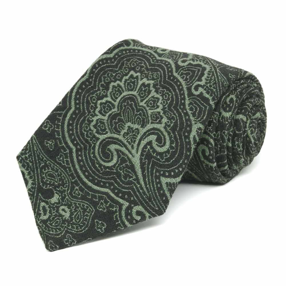 Green on green paisley necktie, rolled to show details up close