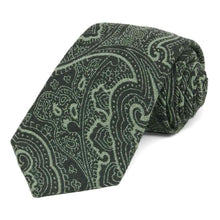 Load image into Gallery viewer, A dark green paisley necktie, rolled to show thick woven texture