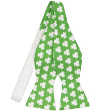 Load image into Gallery viewer, An untied self-tie bow tie in green with white repeating clovers
