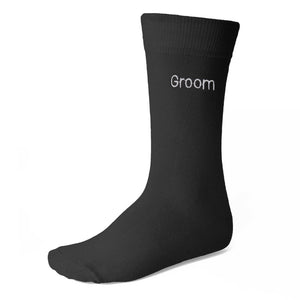 Black wedding dress socks with the word Groom embroidered on the side