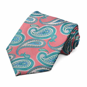 Rolled view of a guava and turquoise paisley tie