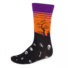 Load image into Gallery viewer, Men&#39;s graveyard theme socks with skeleton pieces on black, orange and purple background