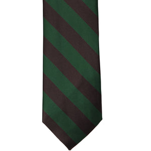 The front of a hunter green and brown striped tie, laid out flat