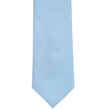 Load image into Gallery viewer, The front of an ice blue herringbone tie, laid out flat