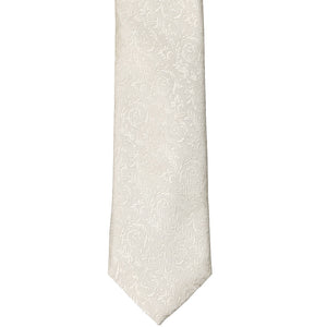 The front of an ivory floral slim tie in a tone-on-tone pattern