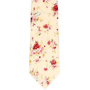 The front of a pink and ivory narrow floral tie