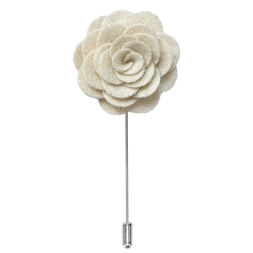 An ivory matte flower lapel pin with a silver tone pin  Edit alt text