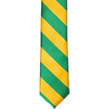 Load image into Gallery viewer, The front of a kelly green and golden yellow striped skinny tie, laid out flat