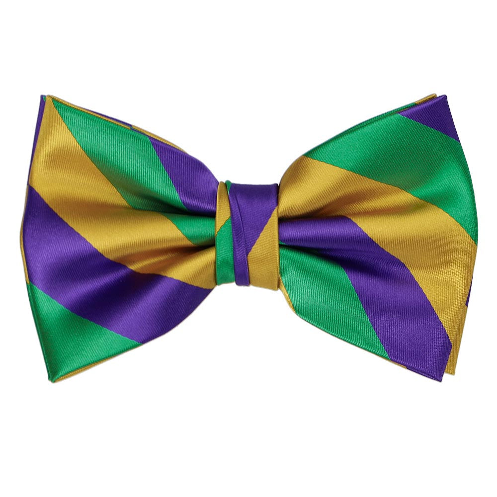 A striped pre-tied bow tie in gold, kelly green and purple