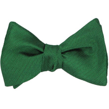 Load image into Gallery viewer, A kelly green self-tie bow tie, tied