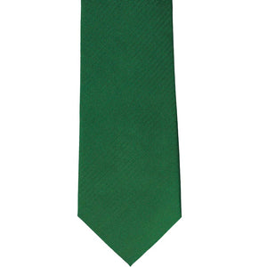 The front of a kelly green herringbone tie