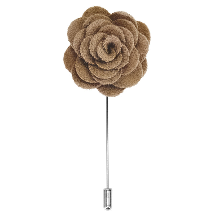 A khaki colored flower lapel pin on a silver toned stick