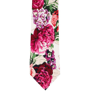 The front of a large pink peony pattern tie, laid out flat