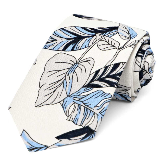 White and blue Hawaiian flower pattern narrow tie, rolled to show off the tie tip