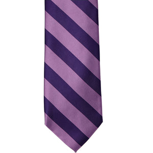 The front of a wisteria and lapis striped tie, laid out flat
