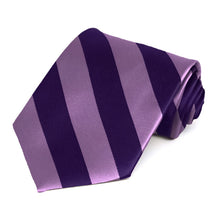 Load image into Gallery viewer, A lapis purple and wisteria striped tie, rolled to show off the front