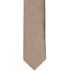 Front view of a latte solid tie in a slim width
