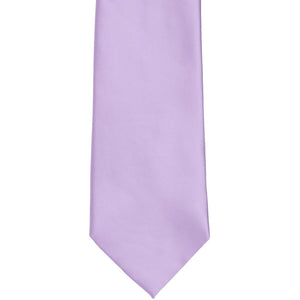 The front of a lavender solid tie, laid out flat