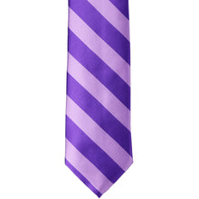 Load image into Gallery viewer, The front of a lavender and purple striped tie in a narrowed width, laid flat