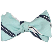 Load image into Gallery viewer, A tied self-tie bow tie in a light pool striped pattern