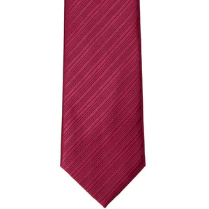 The front of a light burgundy ribbed tie, laid flat