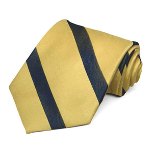 Light gold and navy blue striped necktie rolled to show the texture of the blue stripes