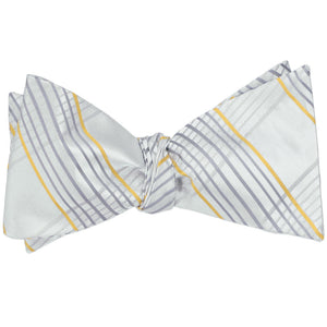 A light gray plaid self-tie bow tie, tied