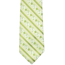 Load image into Gallery viewer, The front, bottom view of a light green floral striped tie
