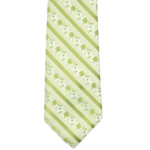 The front, bottom view of a light green floral striped tie