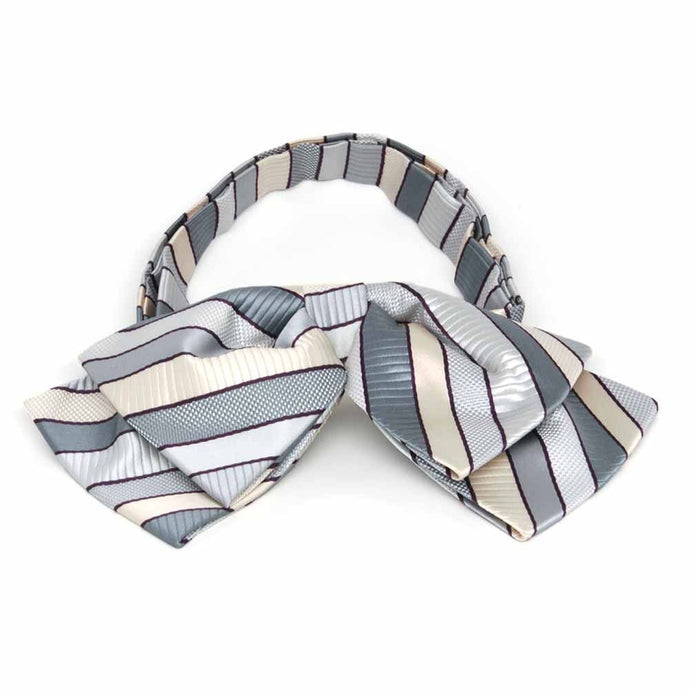 Front view of a light silver and cream striped floppy bow tie
