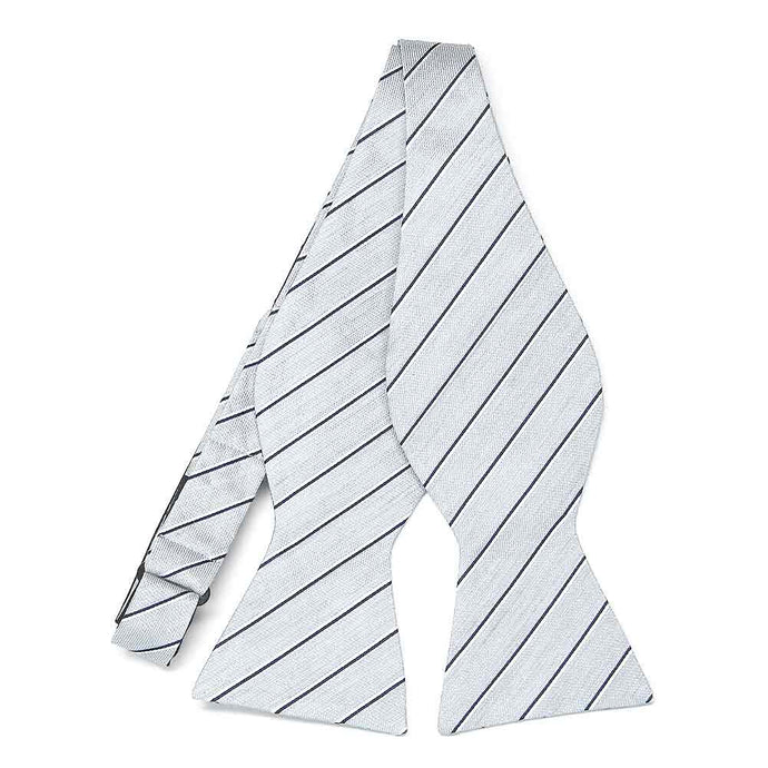 An untied silver and black striped self-tie bow tie
