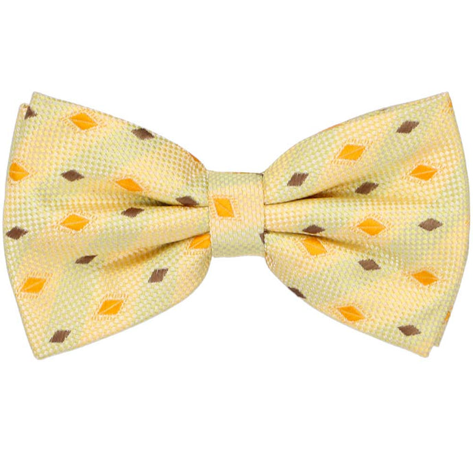 Light yellow bow tie with small orange and brown diamond shapes