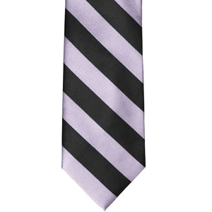 The front of a lilac and black striped tie
