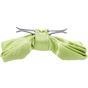 Side view of an opened lime green clip-on bow tie