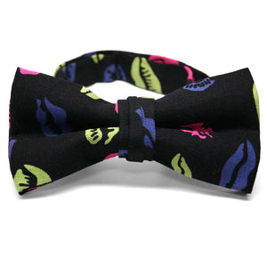 Colorful lips kisses bow tie on a black background.